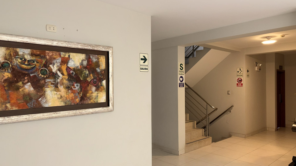 Staircase and evacuation signage in the hotel hallways