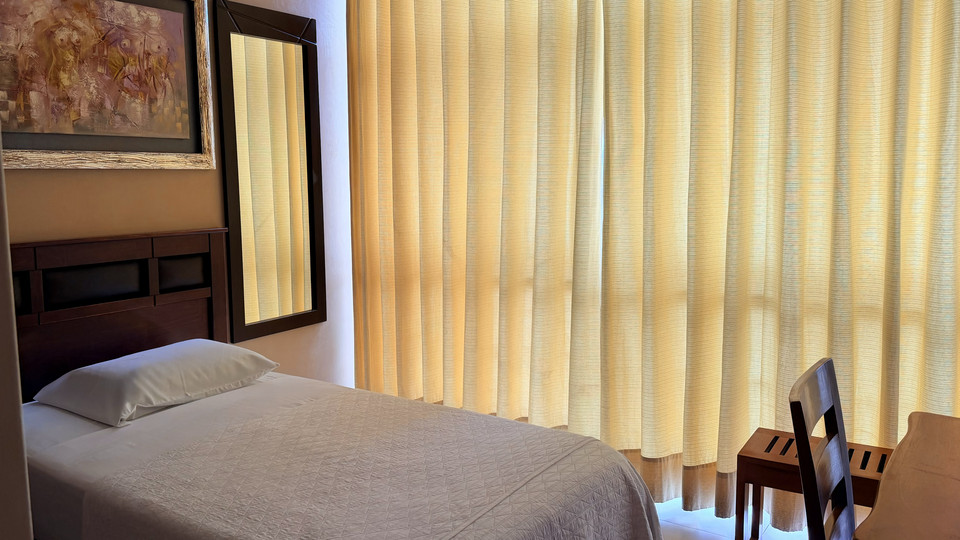 Single Room at Cacique Hotel, with one 1.5-plaza bed for 1 guest
